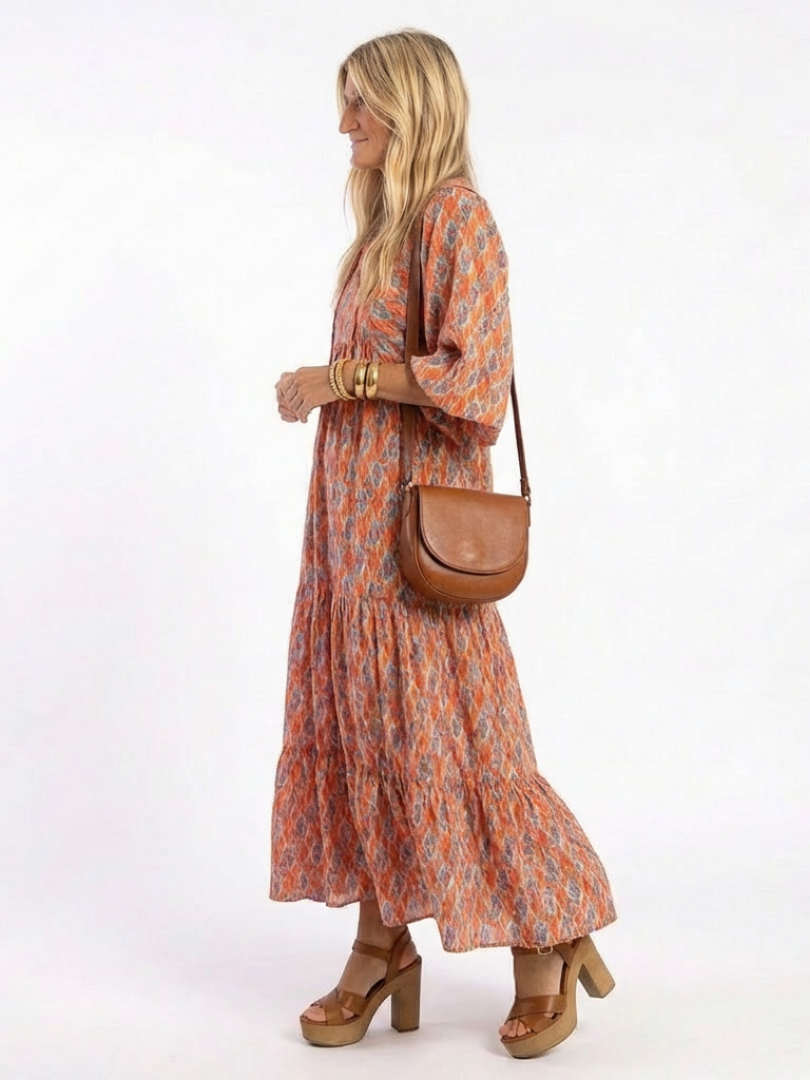 Chiara | Vestido midi estampado geométrico con cuello en v y capas