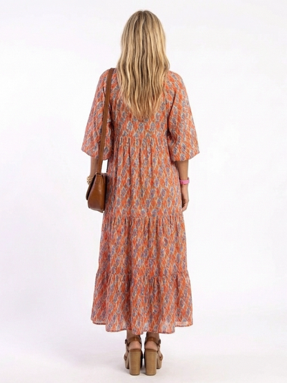 Chiara | Vestido midi estampado geométrico con cuello en v y capas