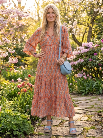 Chiara | Vestido midi estampado geométrico con cuello en v y capas
