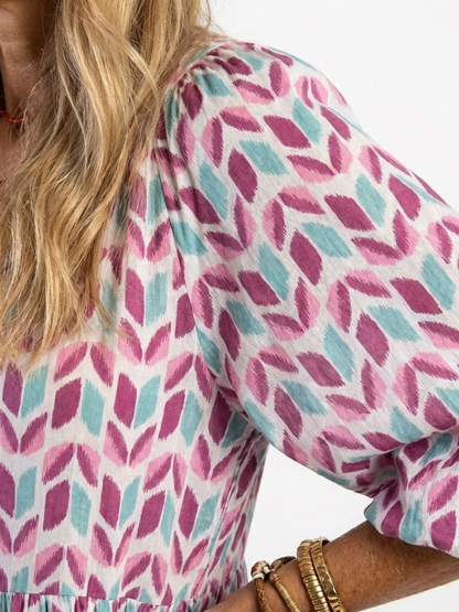 Nadia | Vestido midi de manga larga con capas y estampado geométrico
