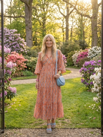 Chiara | Vestido midi estampado geométrico con cuello en v y capas