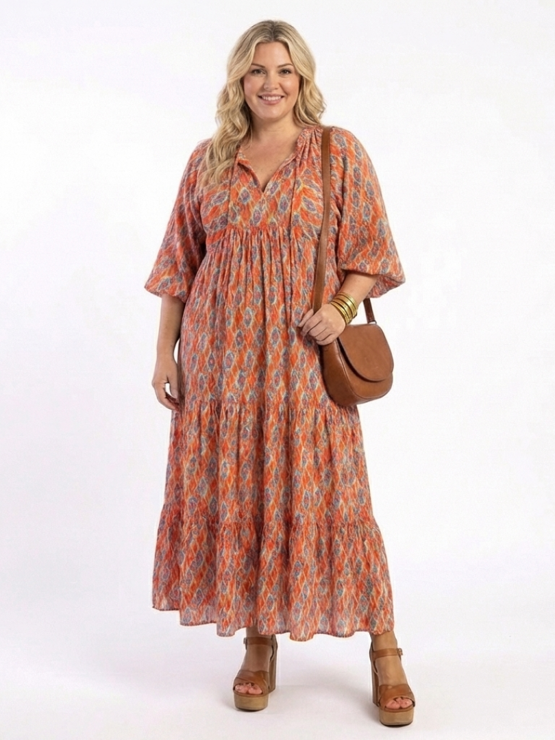 Chiara | Vestido midi estampado geométrico con cuello en v y capas